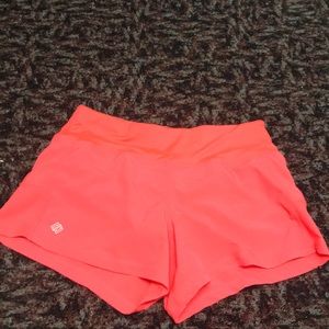 Coral running shorts